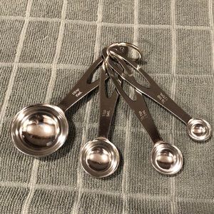 NWOT stainless steel measuring spoons 4 pcs